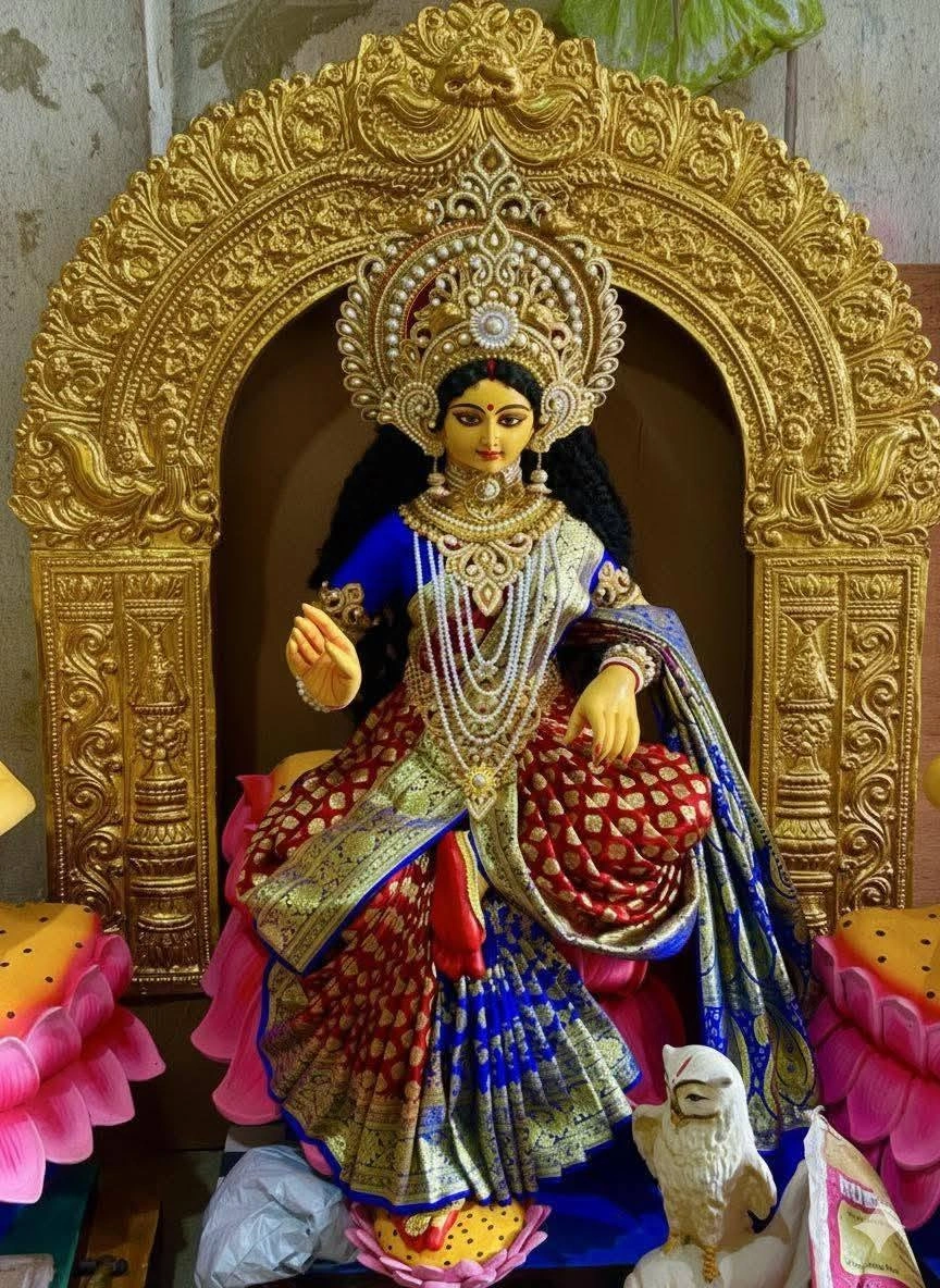 Lakshmi — Coin Shower Pose